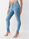 JEANS SKINNY CURVILÍNEOS JENNIE BIG T DE TIRO MEDIO