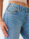 JEANS SKINNY CURVILÍNEOS JENNIE BIG T DE TIRO MEDIO