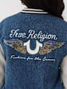 CHAQUETA UNIVERSITARIA DE MEZCLILLA CON ALAS DE CRISTAL