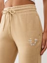 PANTALONES JOGGER CON HERRADURA DE CRISTALES