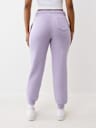PANTALONES JOGGER CON HERRADURA DE CRISTALES