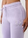PANTALONES JOGGER CON HERRADURA DE CRISTALES