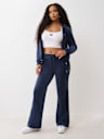 PANTALONES DEPORTIVOS CON PIERNAS RECTAS DE TERCIOPELO CON HERRADURA Y CRISTALES