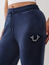 PANTALONES DEPORTIVOS CON PIERNAS RECTAS DE TERCIOPELO CON HERRADURA Y CRISTALES