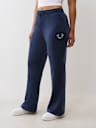 PANTALONES DEPORTIVOS CON PIERNAS RECTAS DE TERCIOPELO CON HERRADURA Y CRISTALES
