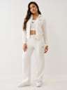 PANTALONES DEPORTIVOS CON PIERNAS RECTAS Y HERRADURA