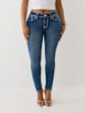 JEANS SKINNY JENNIE CURVILÍNEOS DE TIRO MEDIO BIG T