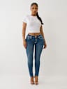 JEANS SKINNY JENNIE CURVILÍNEOS DE TIRO MEDIO BIG T