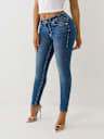 JEANS SKINNY JENNIE CURVILÍNEOS DE TIRO MEDIO BIG T
