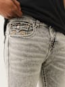 JEANS SKINNY ROCCO CON SOLAPA Y COSTURAS BIG T