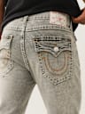 JEANS SKINNY ROCCO CON SOLAPA Y COSTURAS BIG T