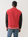 MULTI PATCH FLEECE VARSITY JACKET