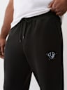 PANTALONES JOGGER CON ESTAMPADO ACOLCHADO Y LOGOTIPO