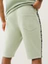 SILICONE LOGO TAPING SWEAT SHORT