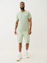 SILICONE LOGO TAPING SWEAT SHORT
