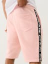 SILICONE LOGO TAPING SWEAT SHORT