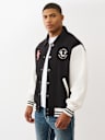COLLARED PATCH FLEECE VARSITY JACKET