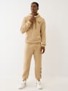 PANTALONES JOGGER CON HERRADURA TRIPLE