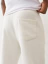 PANTALONES DEPORTIVOS CON PIERNAS RECTAS Y RECUADRO DE BUDDHA