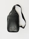 MOCHILA BANDOLERA CON INCRUSTACIONES DE HERRADURAS
