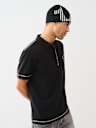 GORRO CON BLOQUES DE COLOR A RAYAS CON HERRADURA