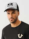 ALLOVER LOGO TRUCKER HAT