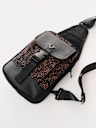 WAVY HORSESHOE SLING BAG