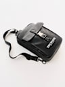 METAL CLASP LOGO SLING BAG