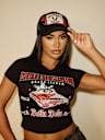 TRUE RELIGION X BELLA DOÑA EMBROIDERED ROSE PATCH TRUCKER HAT