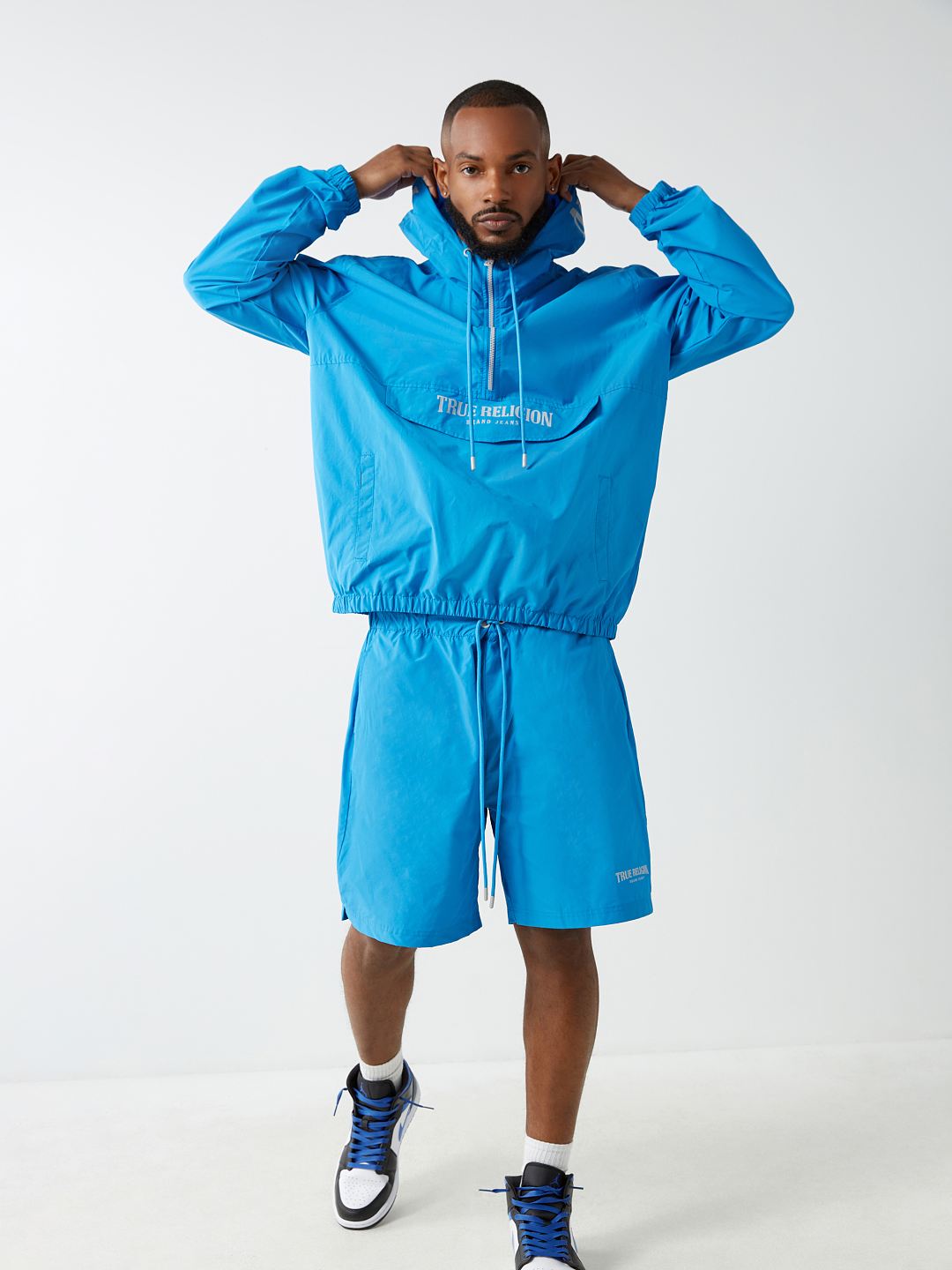 HALF ZIP WINDBREAKER
