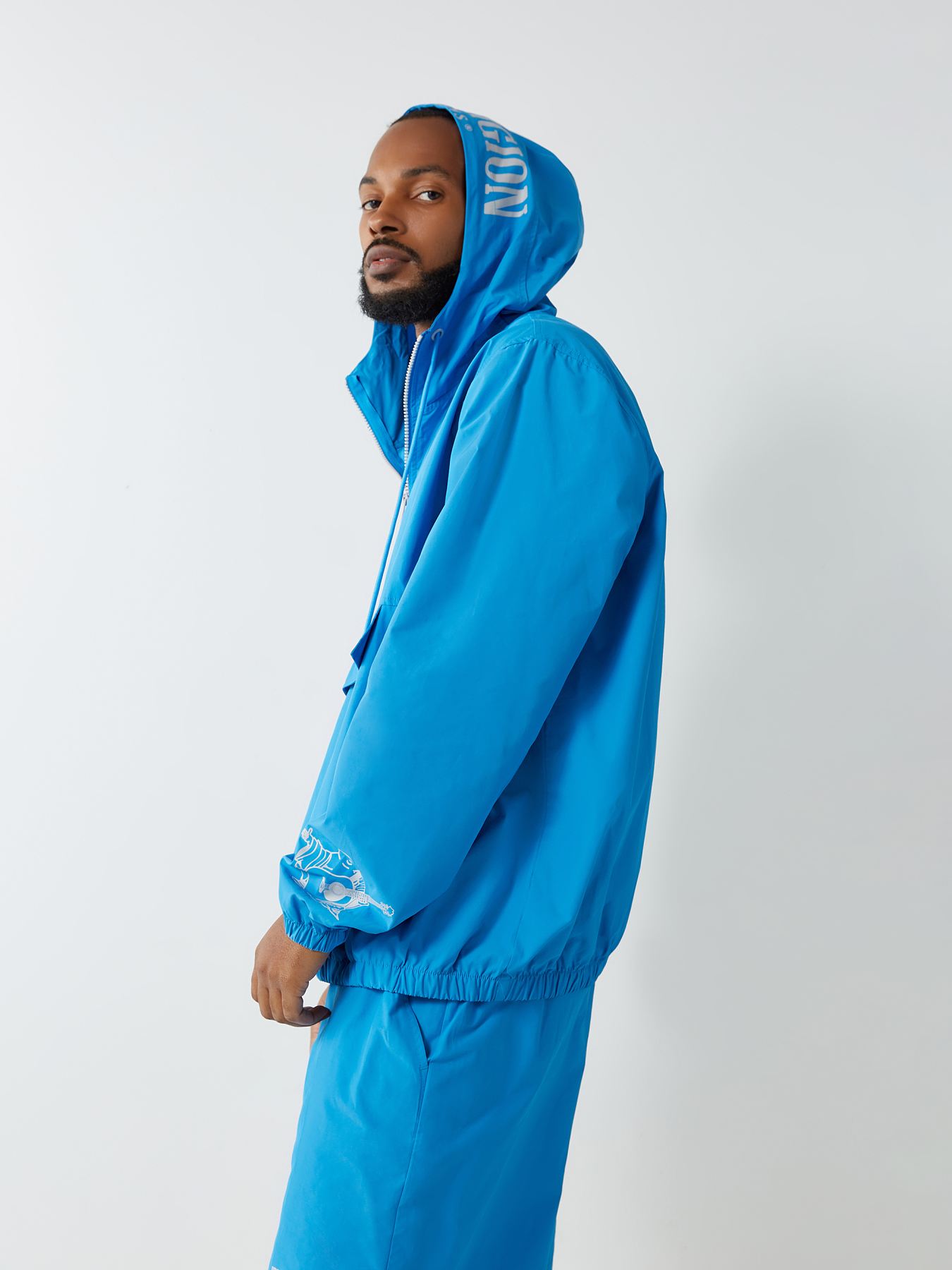 HALF ZIP WINDBREAKER