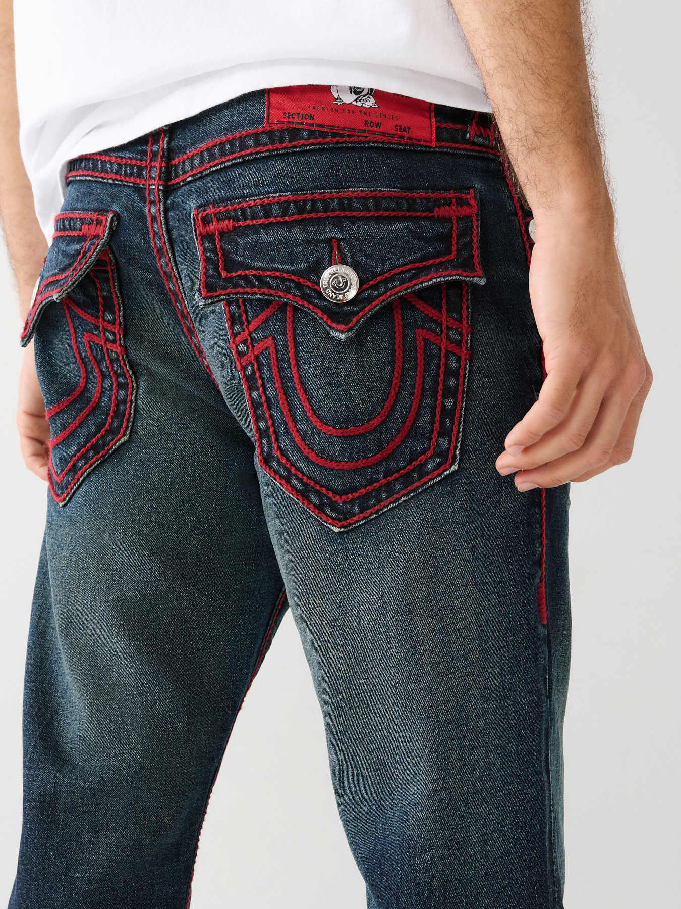 Black true religion jeans with store red stitching