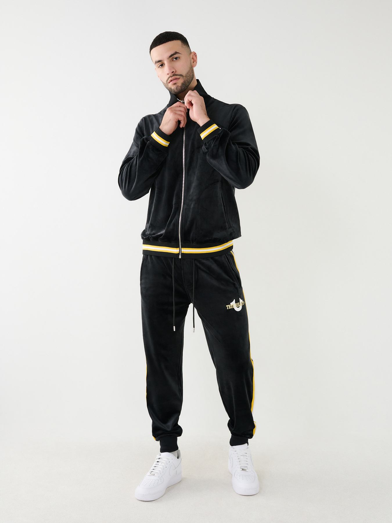 Black and gold true religion store sweat suit