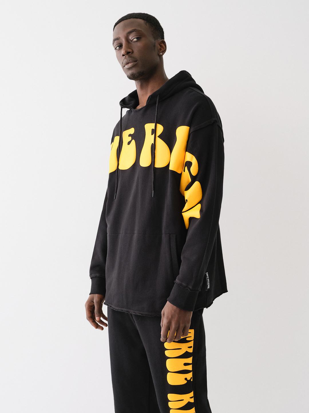 PUFF PRINT RAW HEM HOODIE