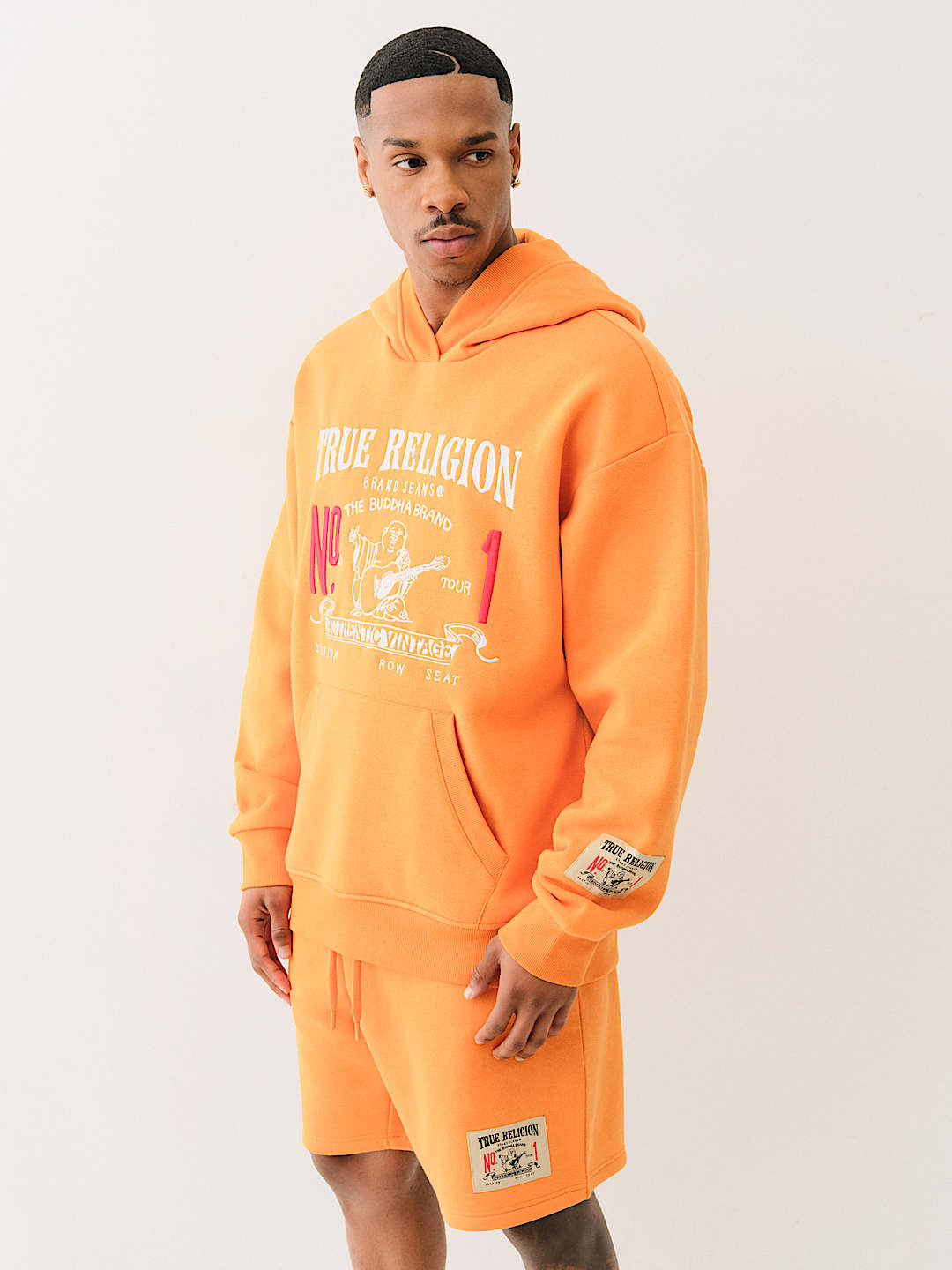 Sweat manches longues en coton bleu avec col à capuche et logo orange et blanc JACK & JONES - CCV Mode