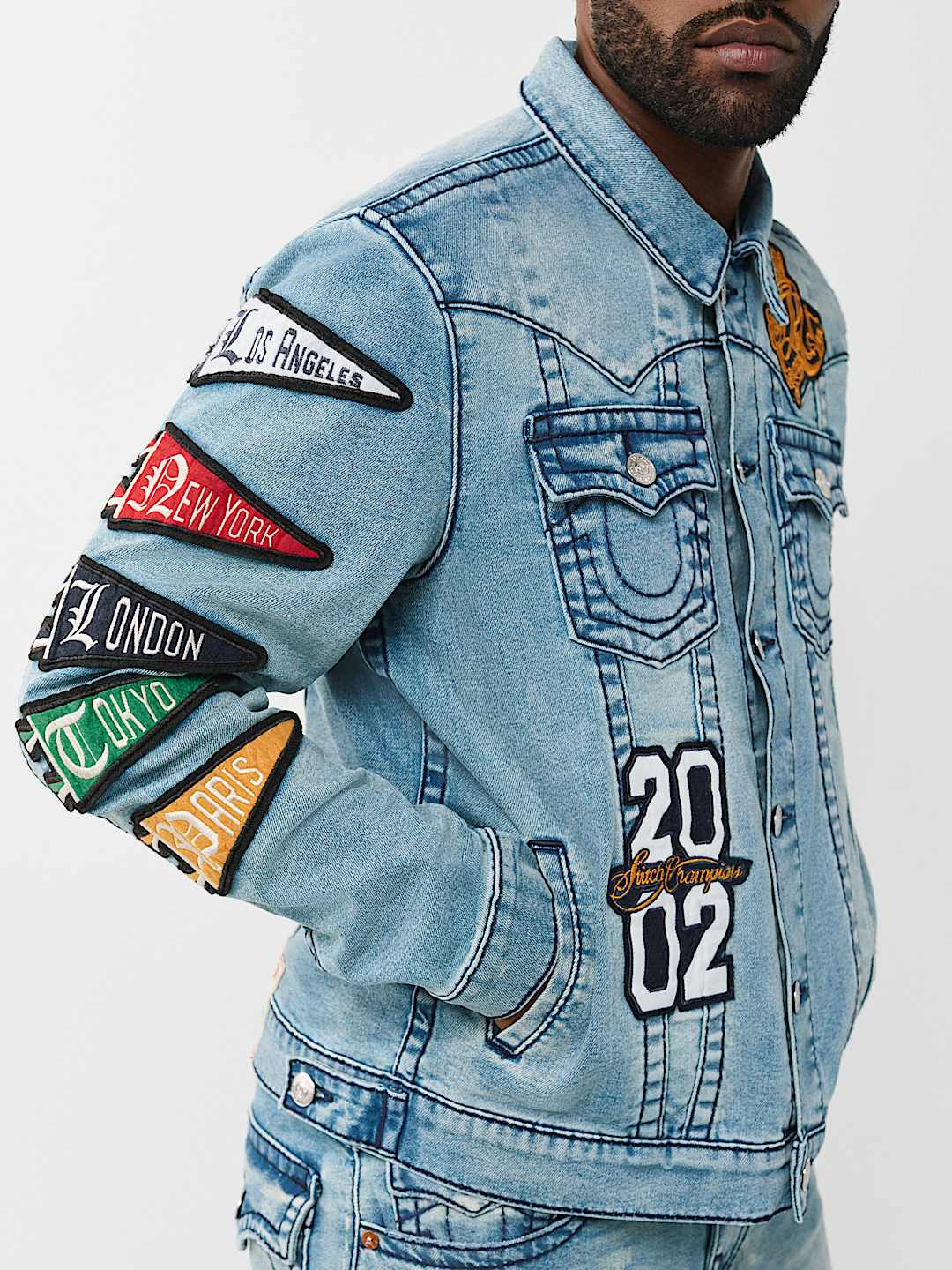 JIMMY VARSITY PATCH BIG T DENIM JACKET - SHATTERED MEDIUM INDIGO