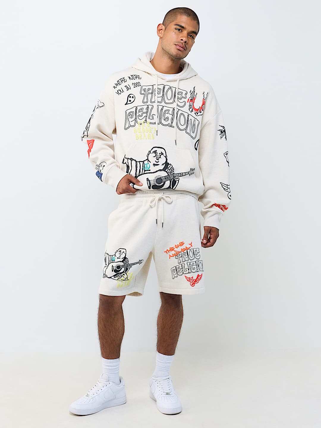 SHORT EN MOLLETON AVEC LOGOS DESSIN&Eacute;S