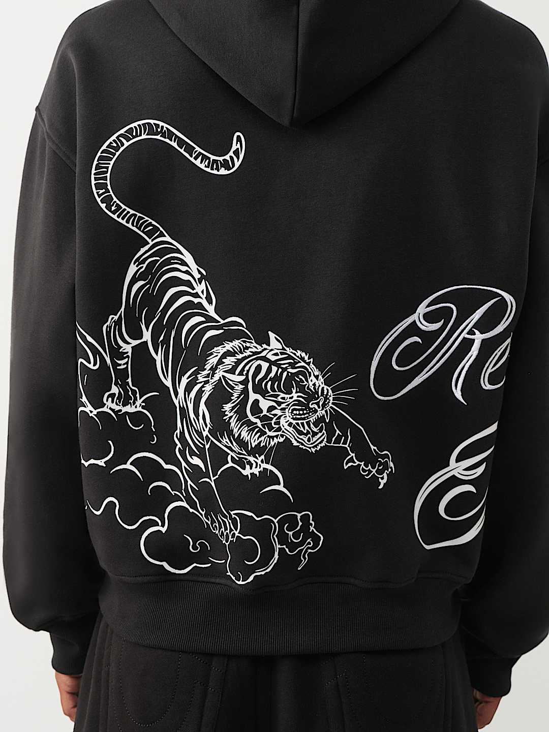 CHANDAIL &Agrave; CAPUCHON AMPLE AVEC LOGO DE TIGRE ET INSCRIPTION