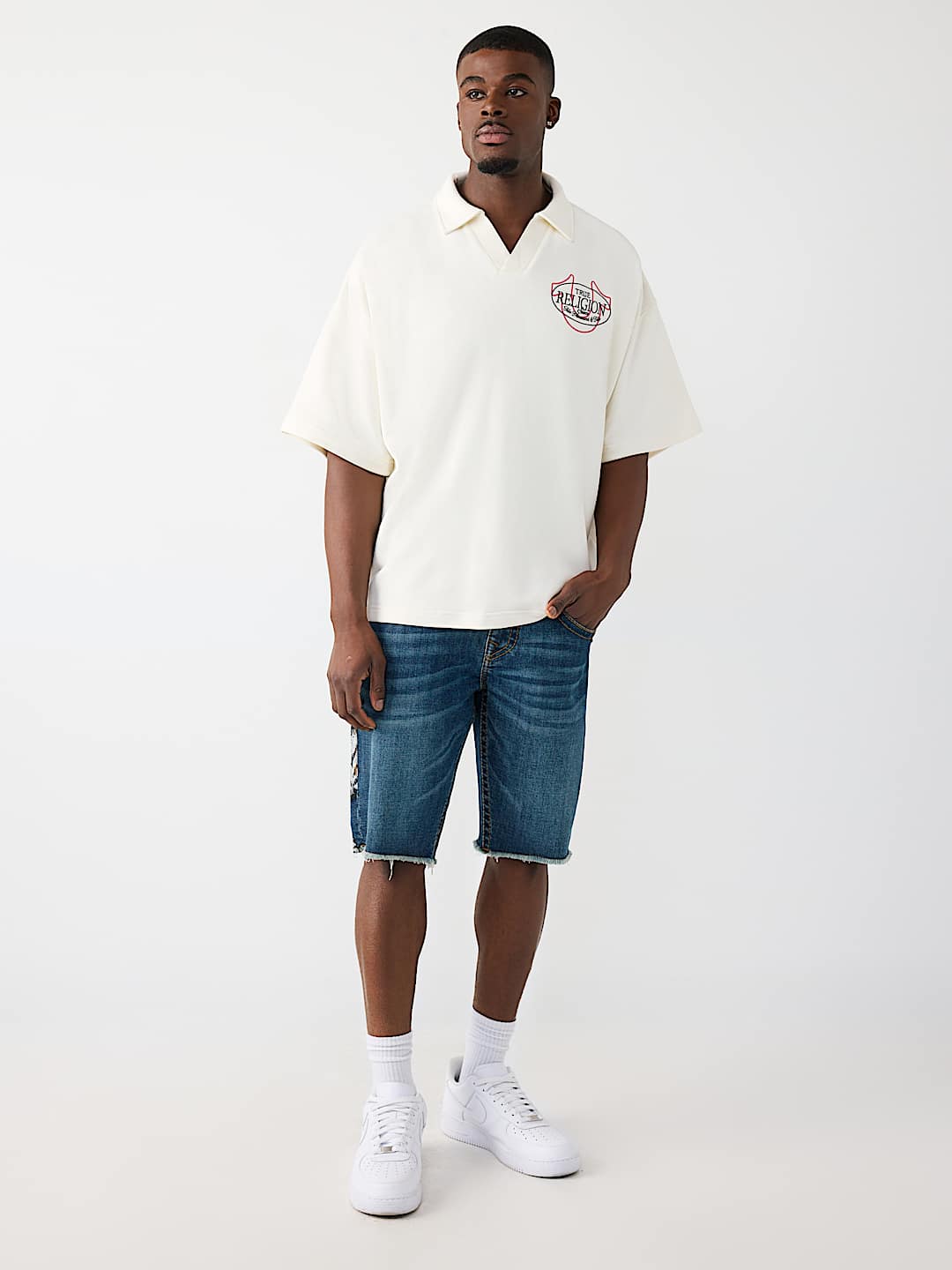 POLO SURDIMENSIONN&Eacute; AVEC LOGO DE TIGRE