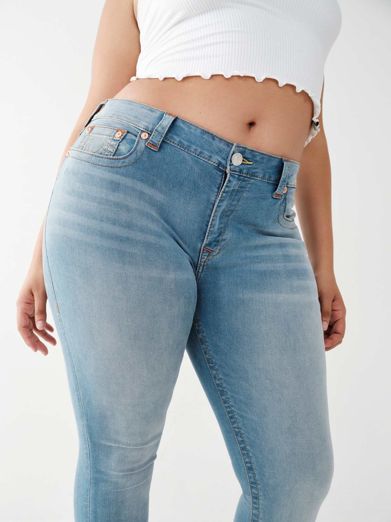 JENNIE MID RISE CURVY SKINNY JEAN