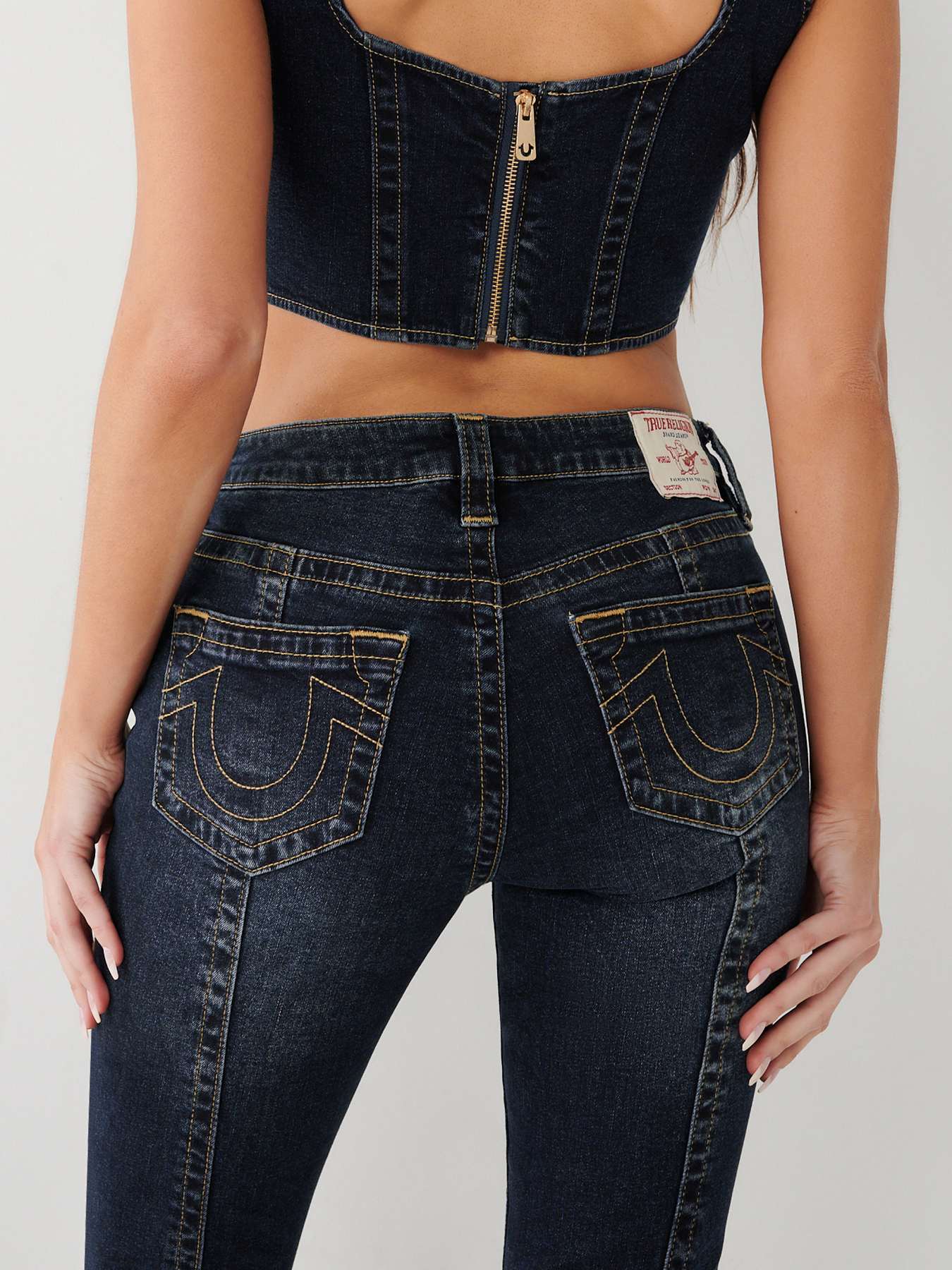 JENNIE MID RISE CURVY SKINNY JEAN