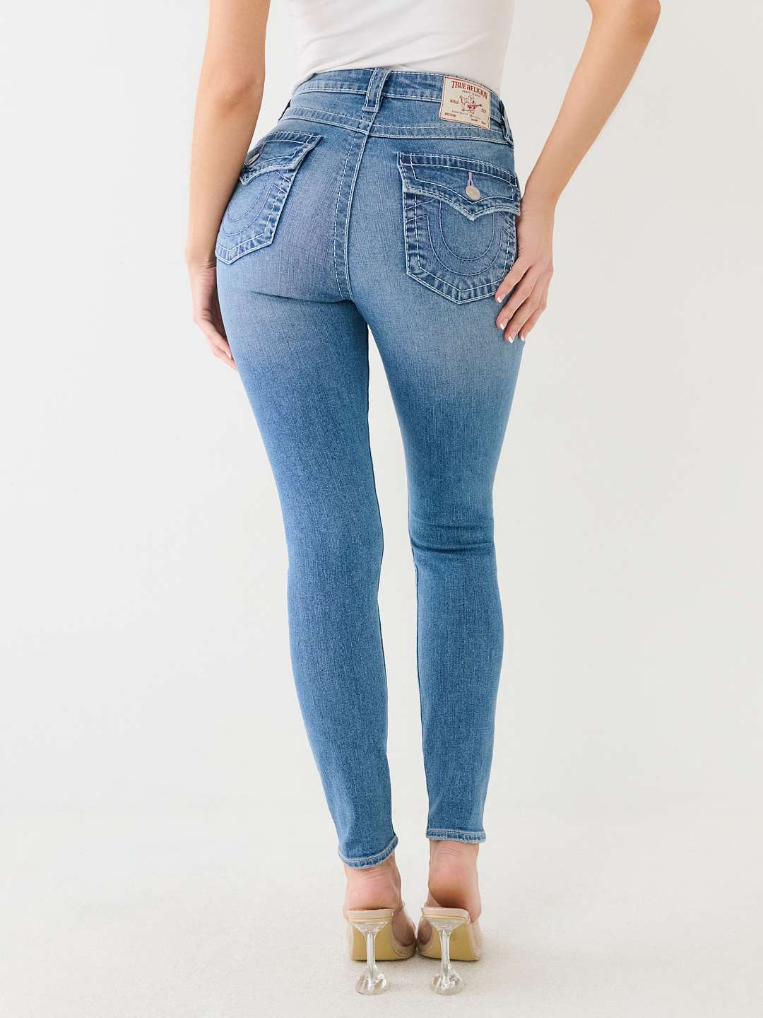 JENNIE DISTRESSED HIGH RISE SKINNY JEAN