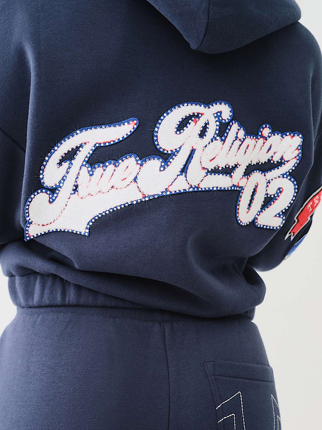 CRYSTAL PATCH ZIP VARSITY HOODIE