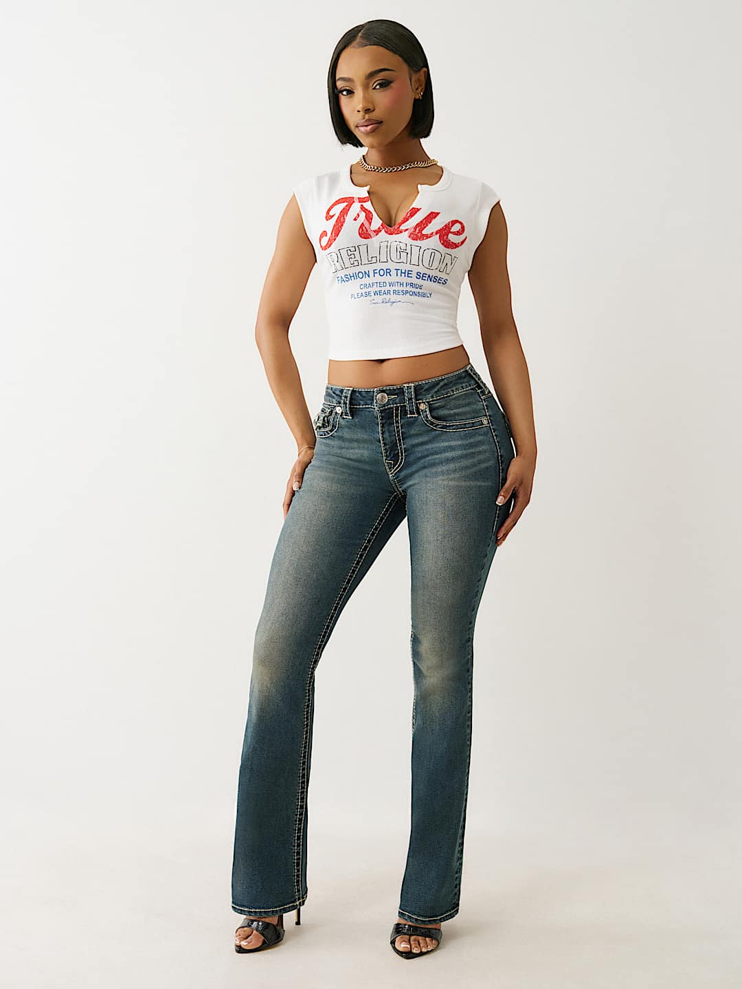 BECCA MID RISE BIG T BOOTCUT JEAN