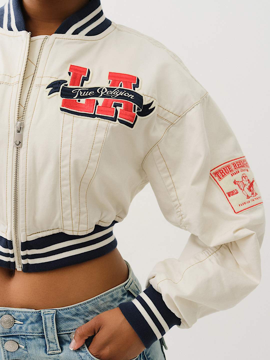 I LOVE TRUE RELIGION' CROPPED VARSITY JACKET - Winter White