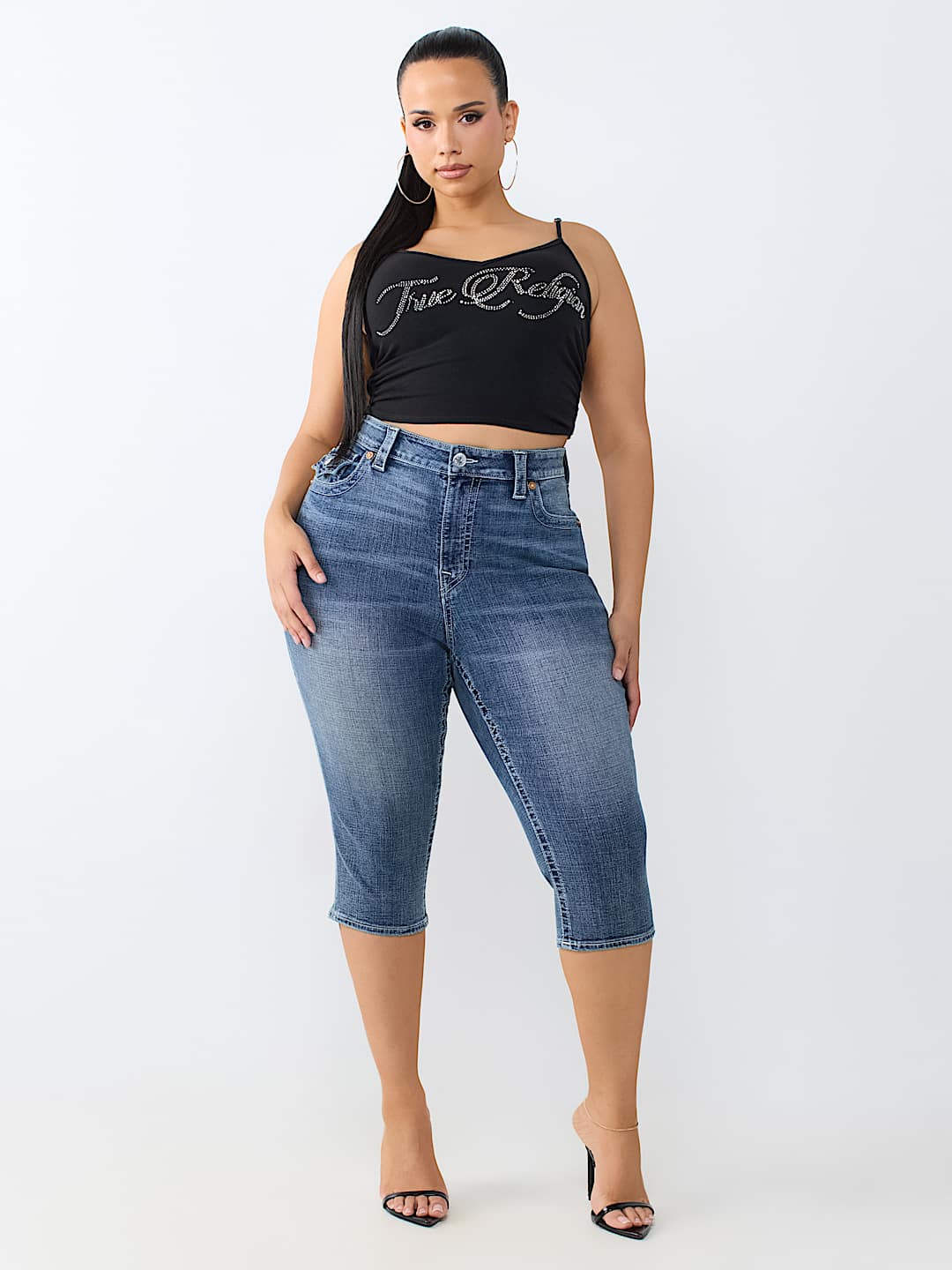 PLUS JENNIE MID RISE FLAP CURVY SKINNY CAPRI