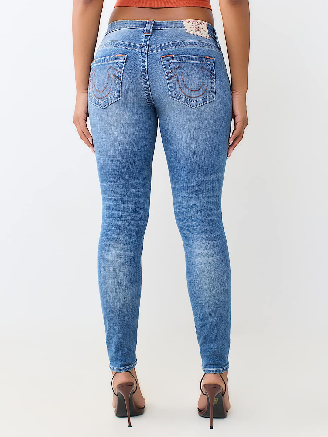 JENNIE MID RISE CURVY SKINNY JEAN