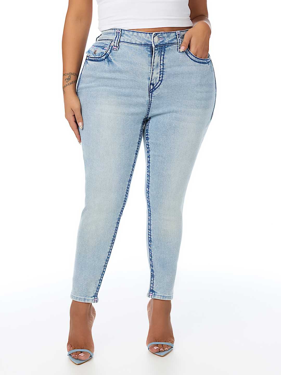 PLUS JENNIE MID RISE SUPER T CURVY SKINNY JEAN