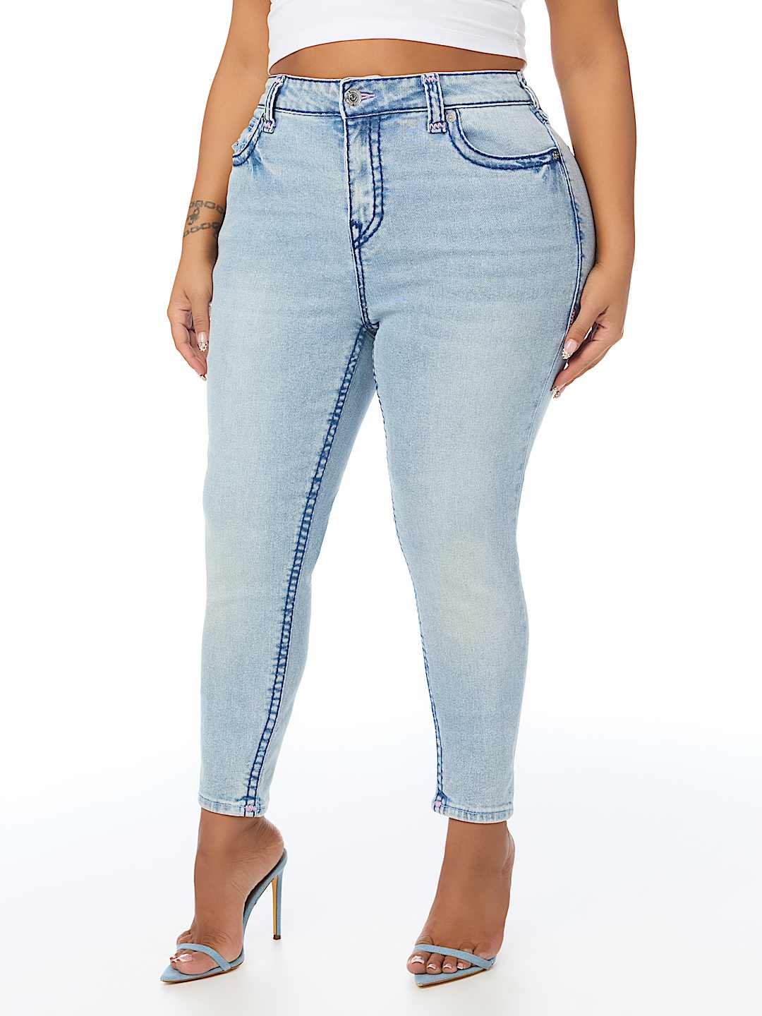 PLUS JENNIE MID RISE SUPER T CURVY SKINNY JEAN
