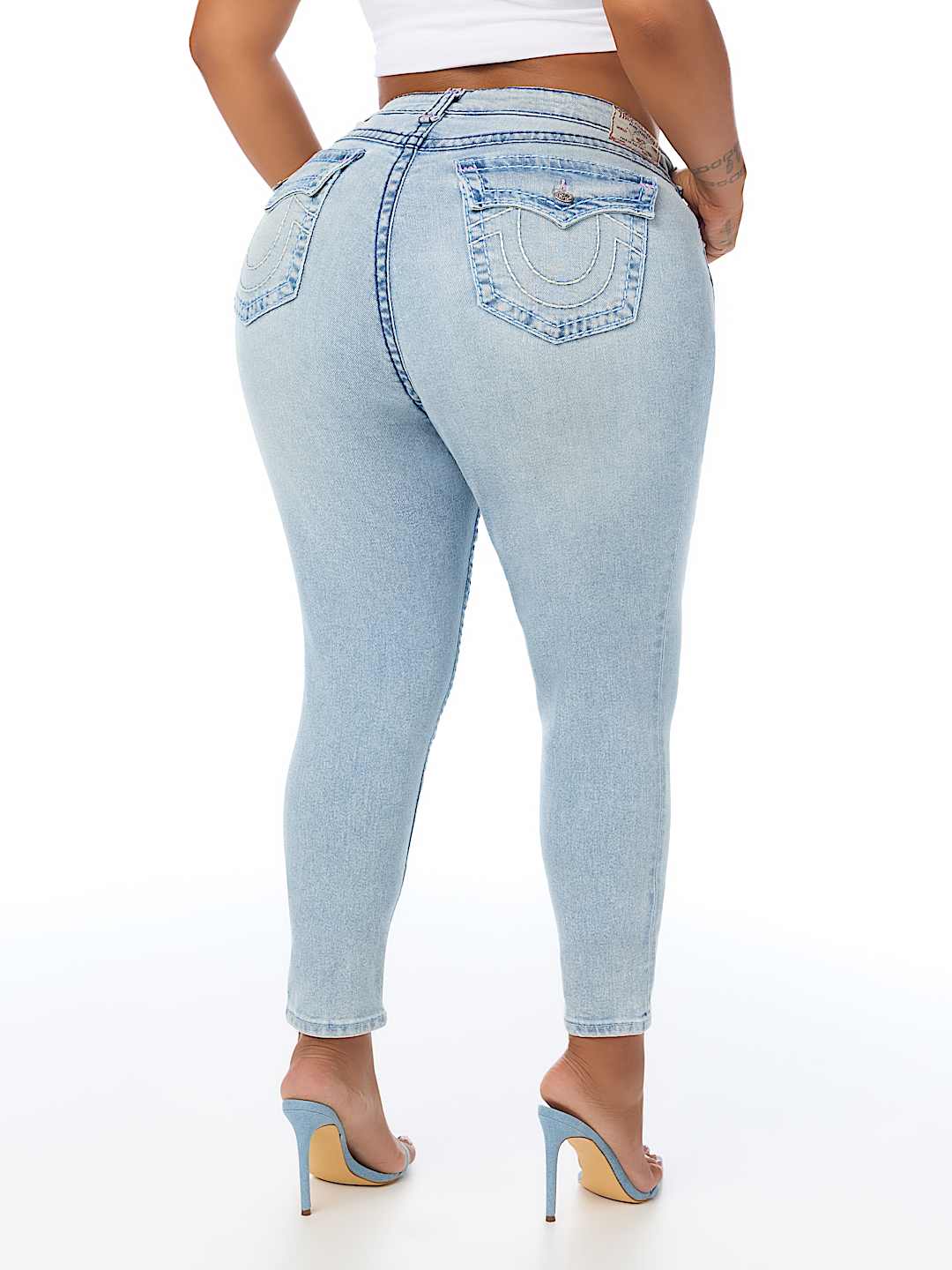 PLUS JENNIE MID RISE SUPER T CURVY SKINNY JEAN